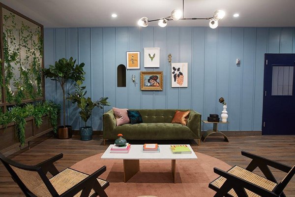 Clubhouse featuring modern design and seating at The Highline Apartments