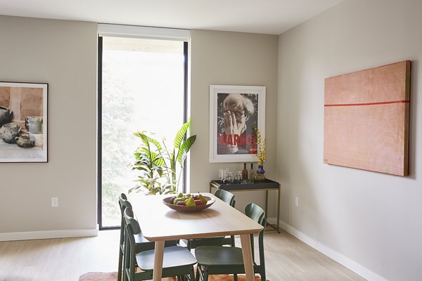 Dining area with modern decor and elegant lighting at The Highline Apartments