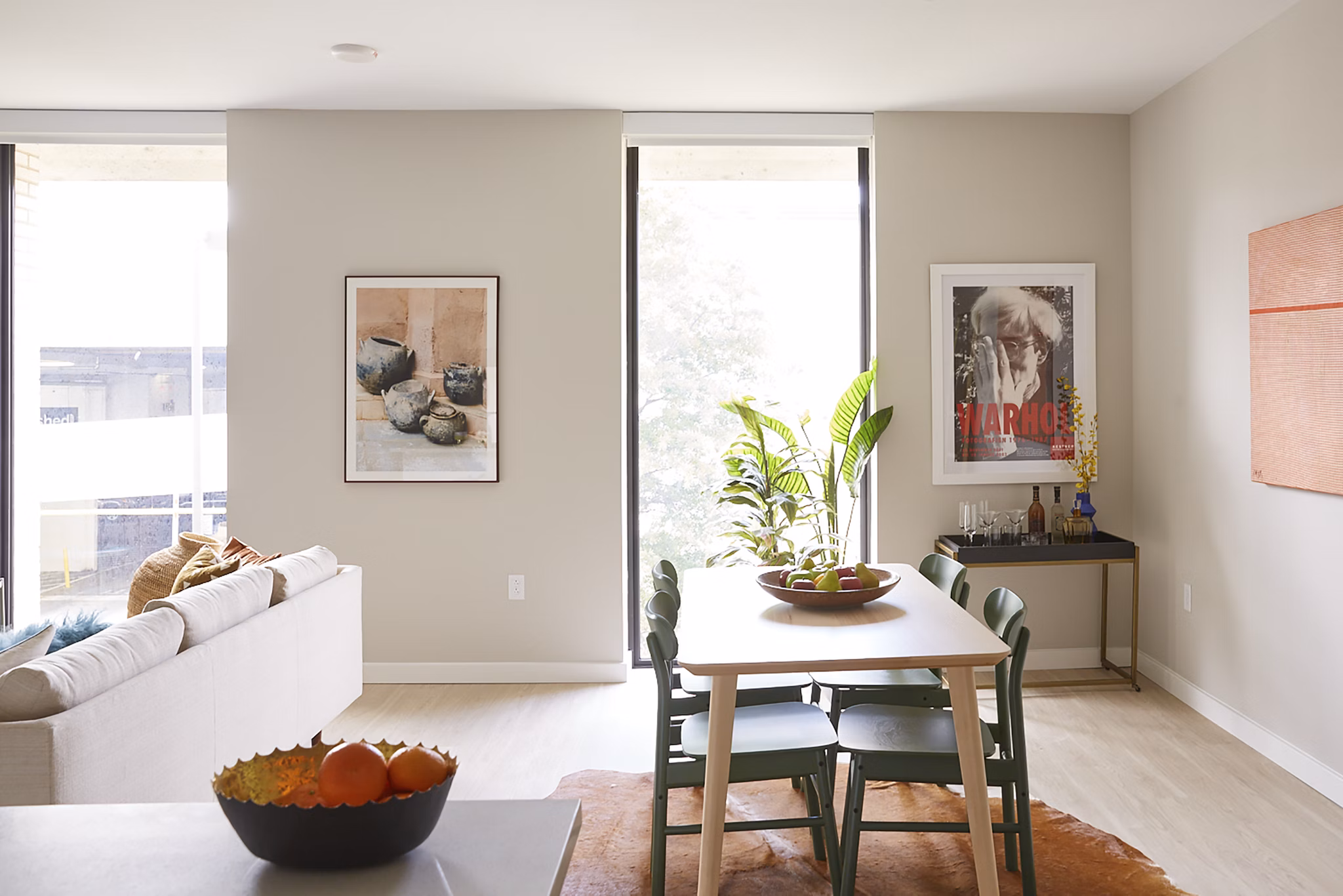 Modern dining area with elegant furnishings in The Highline Apartments, offering a luxurious living experience