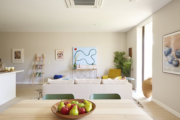 Dining area with elegant modern furnishings at The Highline Apartments