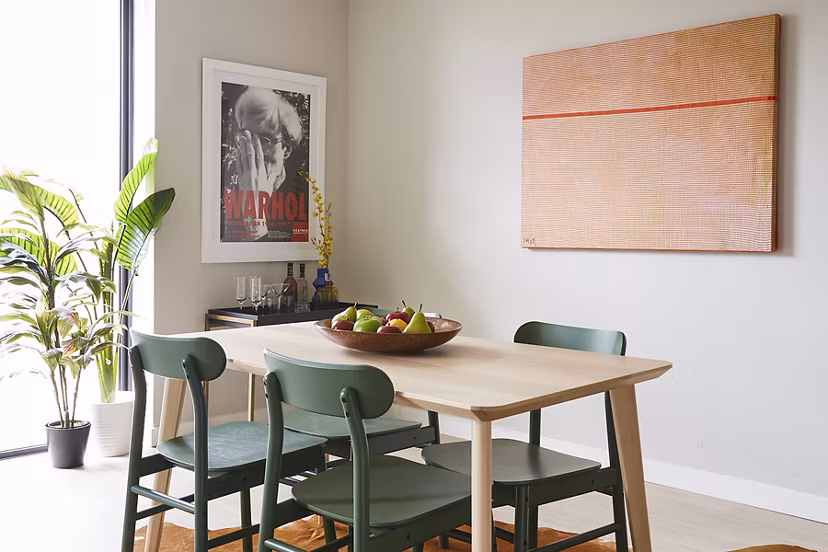Elegant dining area with modern furnishings in The Highline Apartments