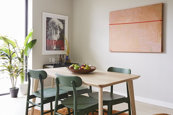 Elegant dining area with modern furnishings in The Highline Apartments