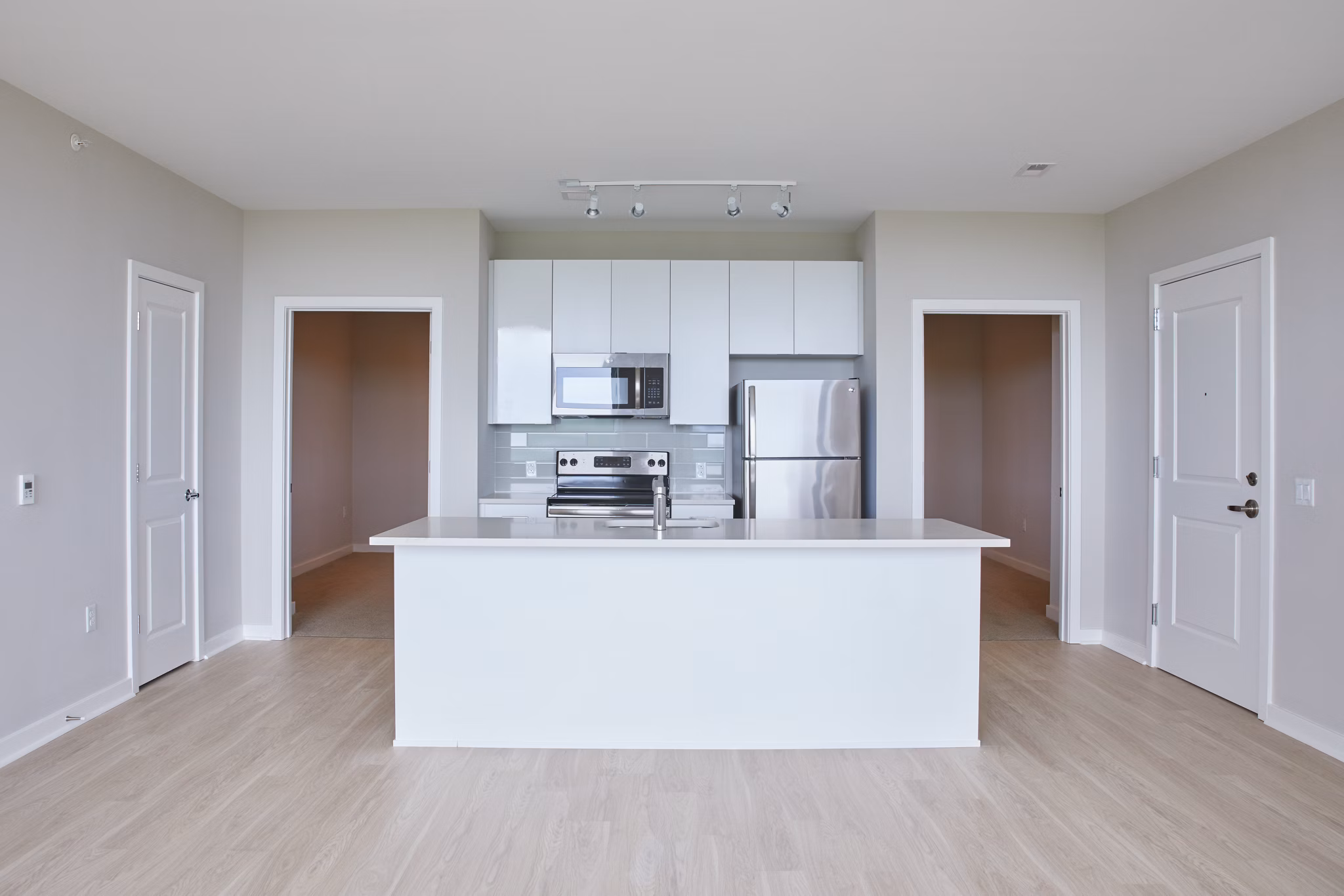 The Highline Apartments: Modern kitchen with stainless steel appliances and granite countertops