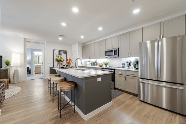 Kitchen featuring modern appliances at Solara Vista Apartments