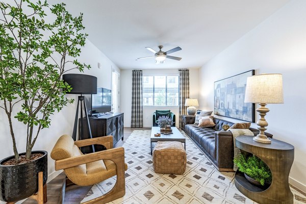 Elegant living room with modern decor in Solara Vista Apartments