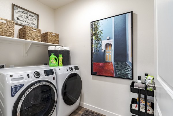 Modern laundry facility with energy-efficient machines at Solara Vista Apartments