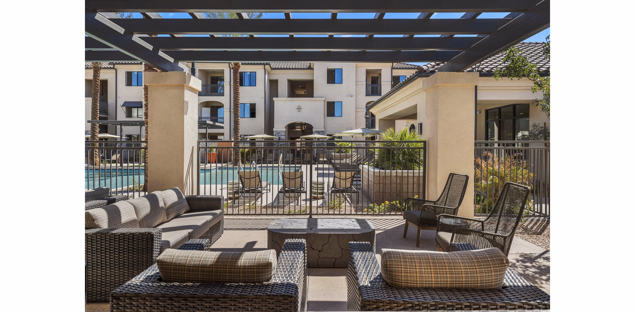 Outdoor patio area with stylish seating at Solara Vista Apartments offering luxury living