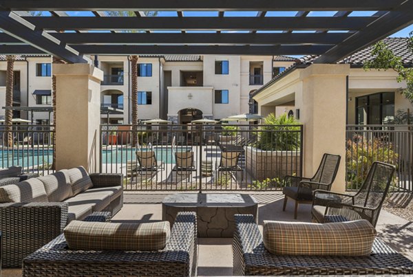 Outdoor patio area with stylish seating at Solara Vista Apartments offering luxury living