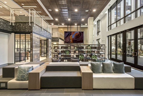 Clubhouse with vibrant seating and modern design at Union Heights Apartments