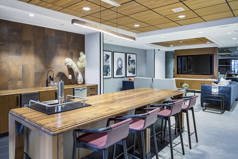 Modern clubhouse with lounge seating at Union Heights Apartments offering luxury amenities and social spaces in an exclusive community setting