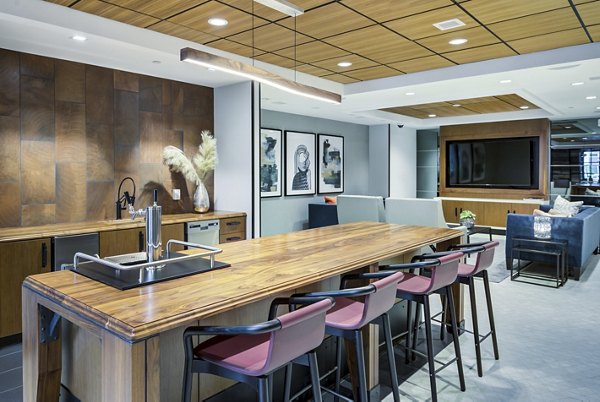 Modern clubhouse with lounge seating at Union Heights Apartments offering luxury amenities and social spaces in an exclusive community setting