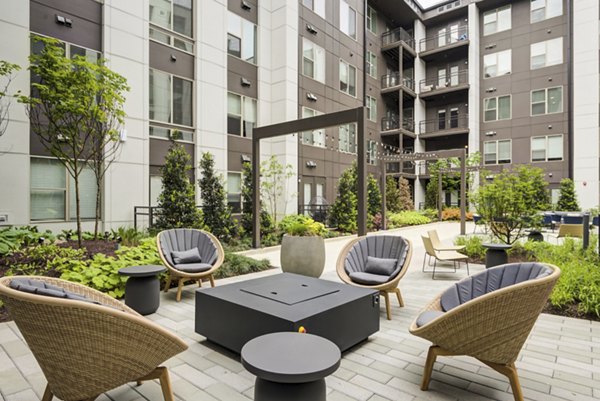 Outdoor lounging area with fire pit at Union Heights Apartments