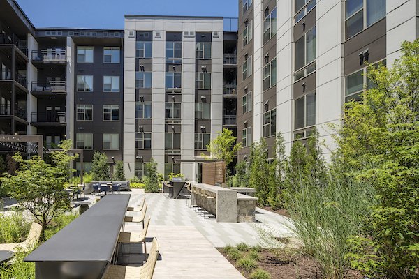 Tranquil courtyard with lush greenery at Union Heights Apartments, a luxury Greystar community