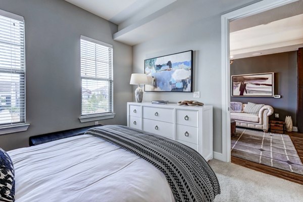 Cozy bedroom with modern decor in The Kathryn Apartments