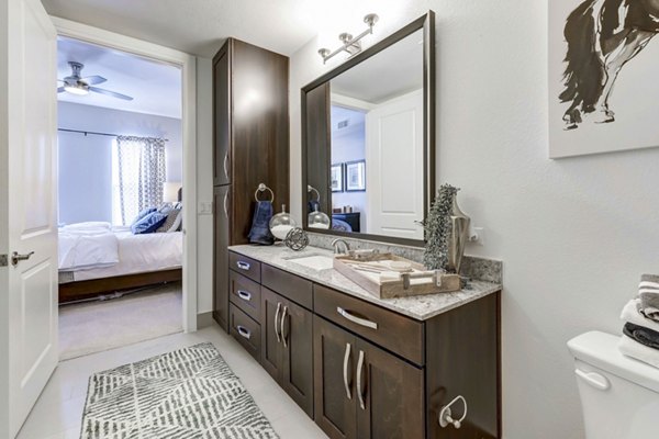 Modern bathroom with sleek fixtures at The Kathryn Apartments offering luxury living experiences