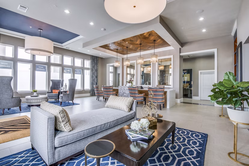 Clubhouse lobby featuring modern decor and cozy seating at The Kathryn Apartments