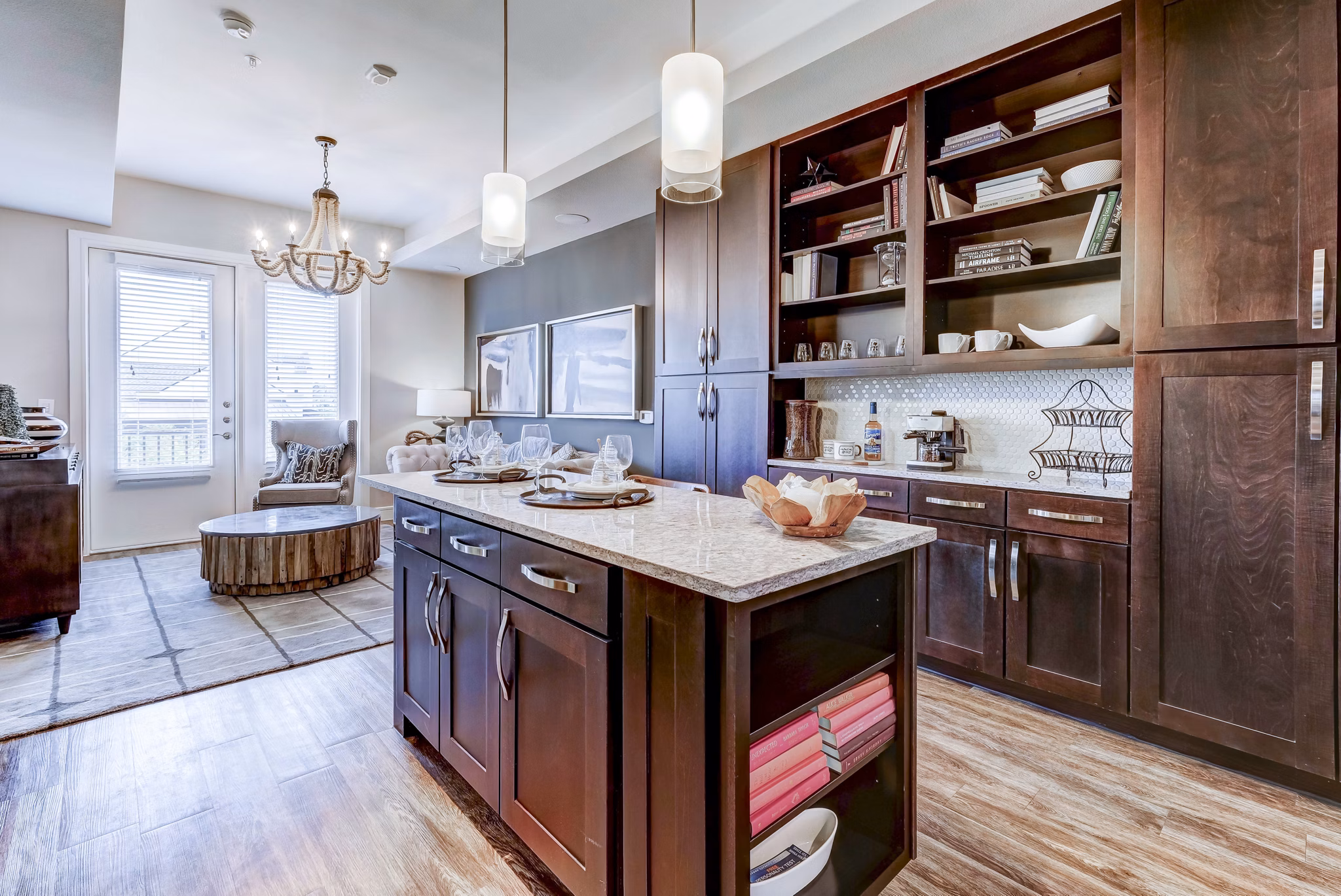 Modern kitchen with stainless steel appliances at The Kathryn Apartments in Greystar
