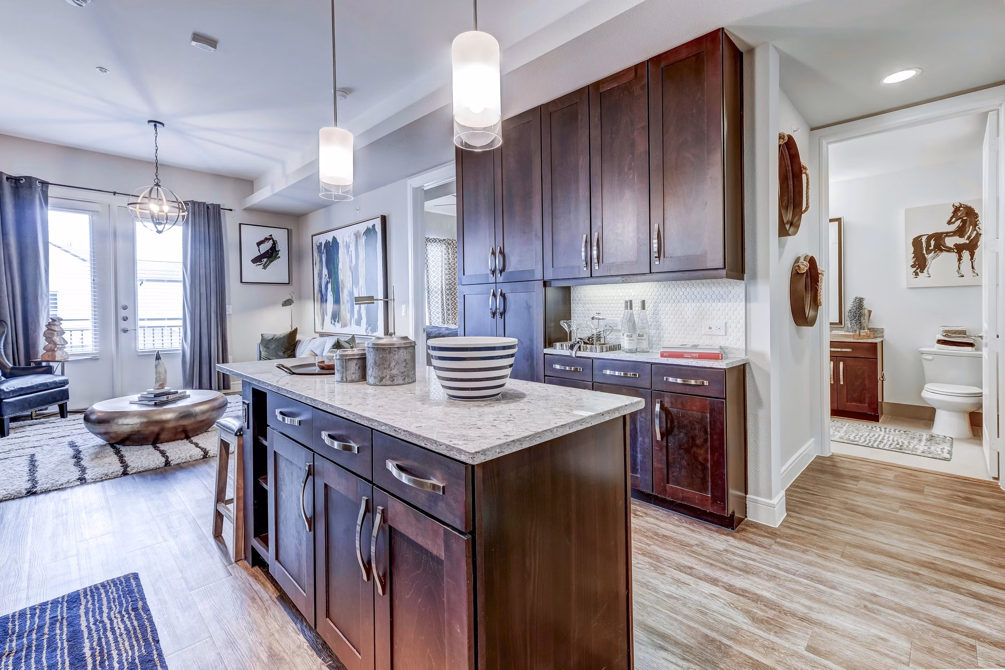 Modern kitchen with stainless steel appliances at The Kathryn Apartments