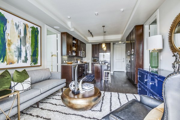 Modern living room with plush seating and stylish decor at The Kathryn Apartments