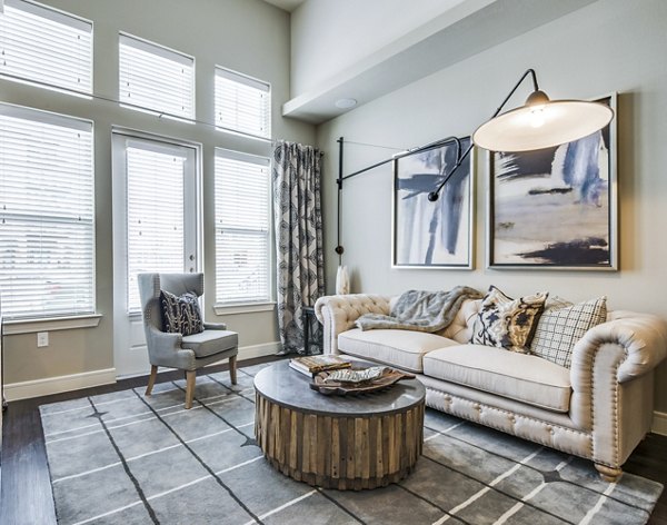 Contemporary living room with stylish decor at The Kathryn Apartments