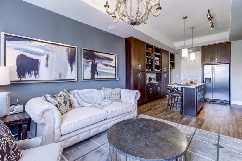 Modern living room with stylish decor at The Kathryn Apartments in Greystar's luxury community