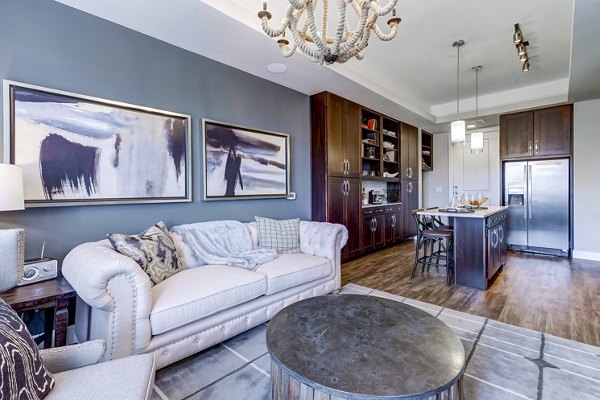 Modern living room with stylish decor at The Kathryn Apartments in Greystar's luxury community