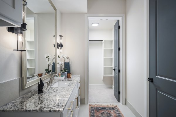 Modern bathroom with elegant fixtures at The Margo Apartments