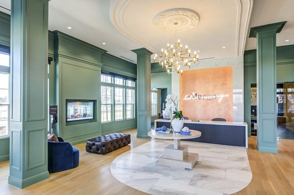 Welcoming clubhouse lobby with modern decor at The Margo Apartments, ideal for social gatherings and relaxation