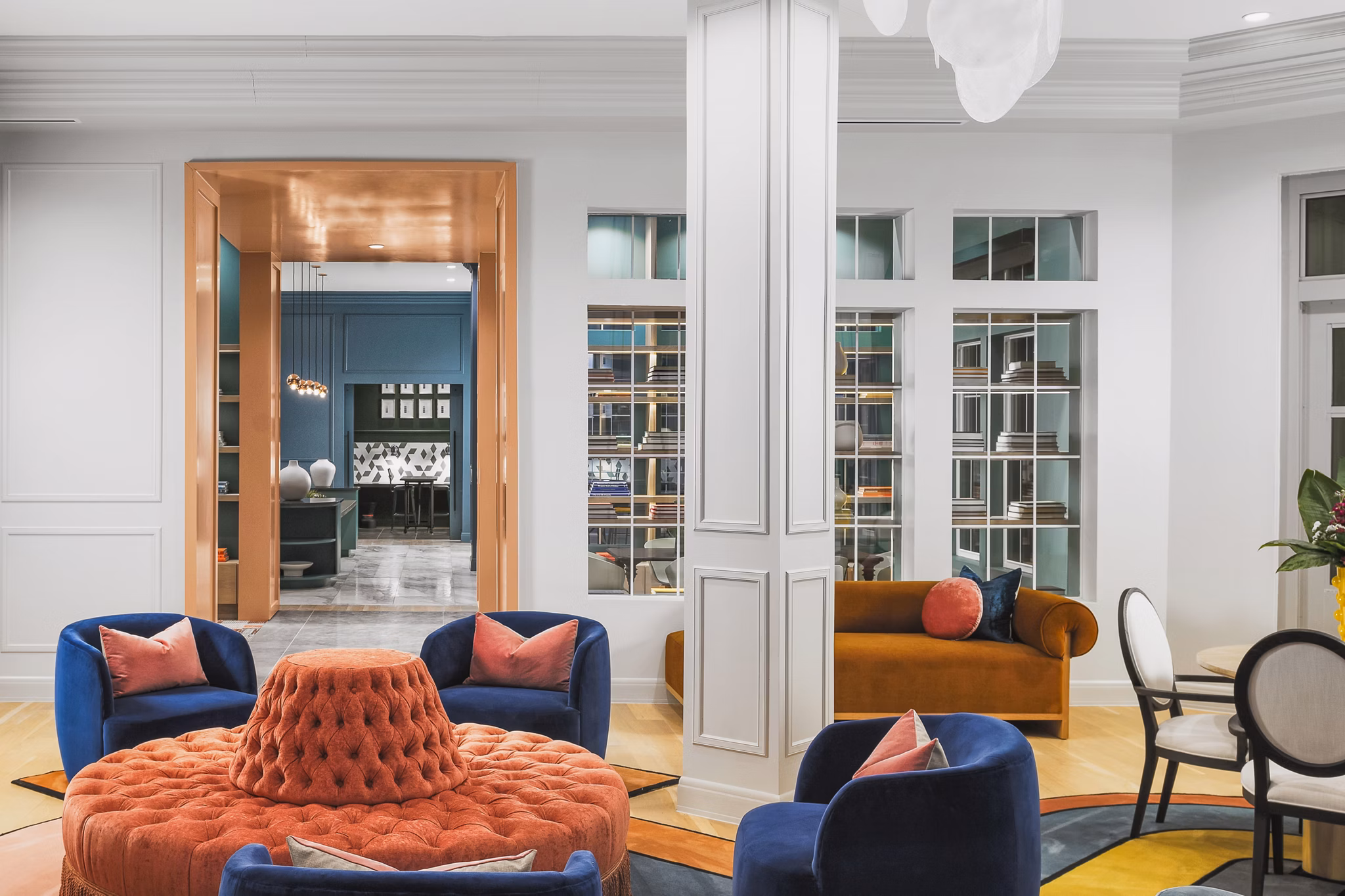 The Margo Apartments: Elegant clubhouse lobby with modern decor and seating for residents