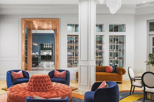 The Margo Apartments: Elegant clubhouse lobby with modern decor and seating for residents