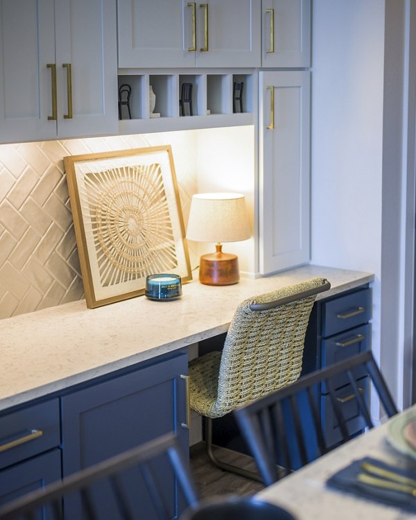 Home office with modern decor and ergonomic furniture in The Margo Apartments