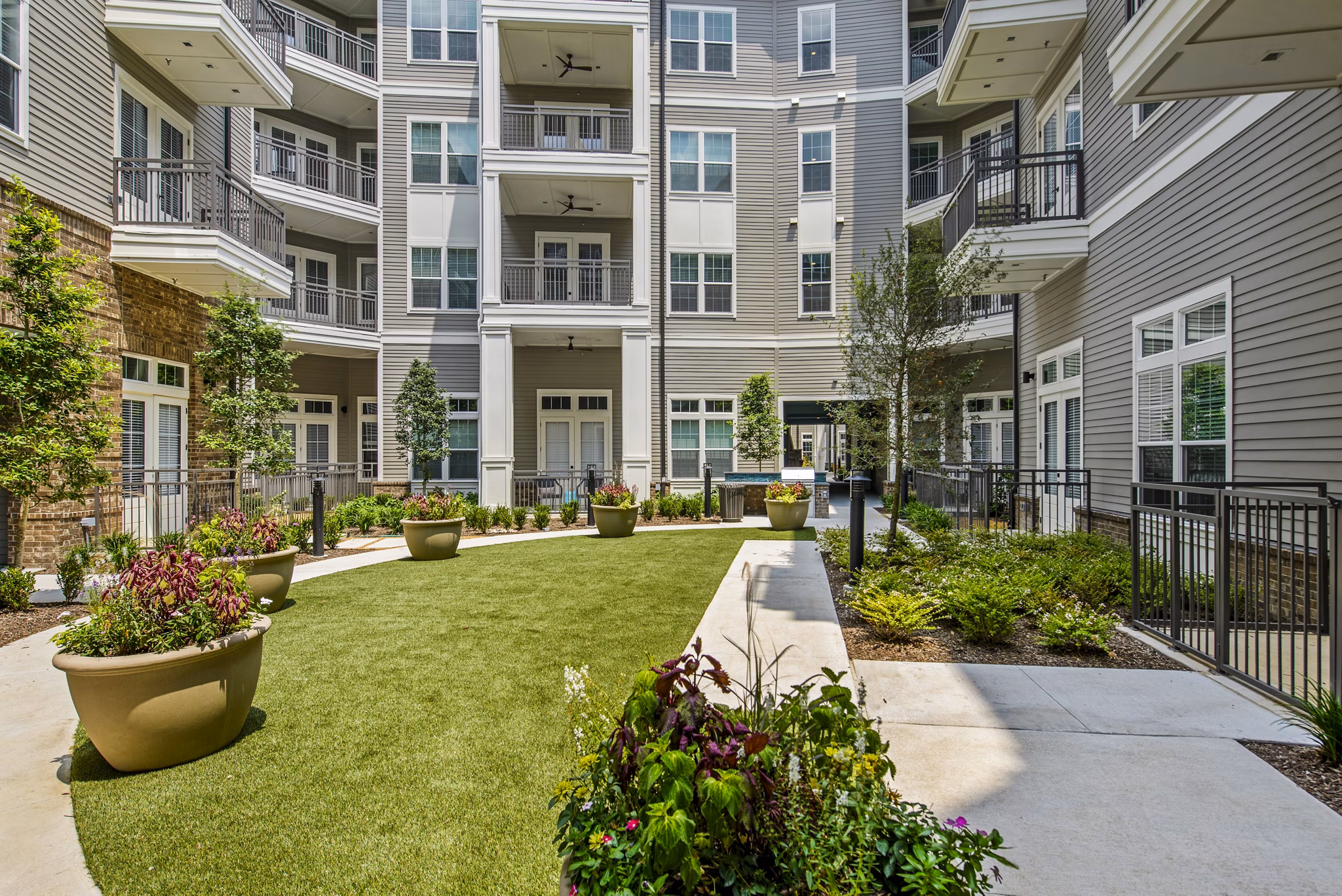 Outdoor patio with stylish seating at The Margo Apartments, a luxury community offering beautiful living spaces and premium amenities