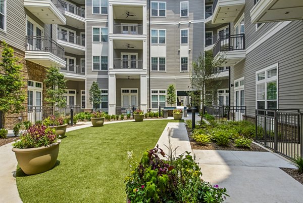 Outdoor patio with stylish seating at The Margo Apartments, a luxury community offering beautiful living spaces and premium amenities