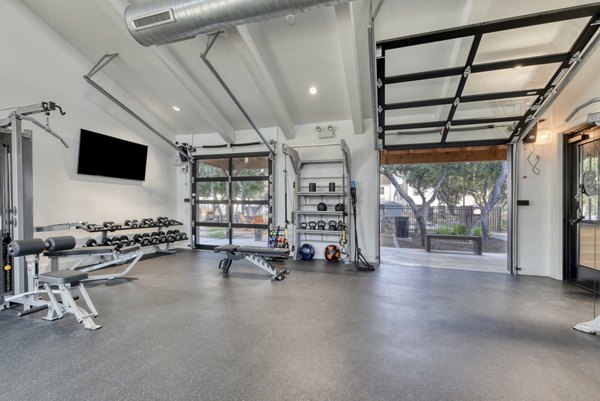 Fitness center with state-of-the-art equipment at Farm Haus Luxury Rental Homes Apartments