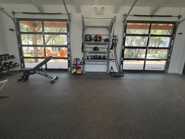 State-of-the-art fitness center at Farm Haus Luxury Rental Homes with modern equipment for active lifestyles