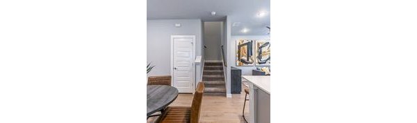 living room/stairway at Farm Haus Luxury Rental Homes