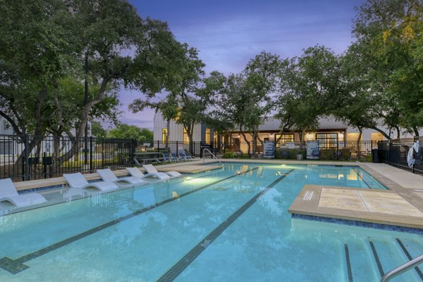 Elegant outdoor pool area at Farm Haus Luxury Rental Homes Apartments