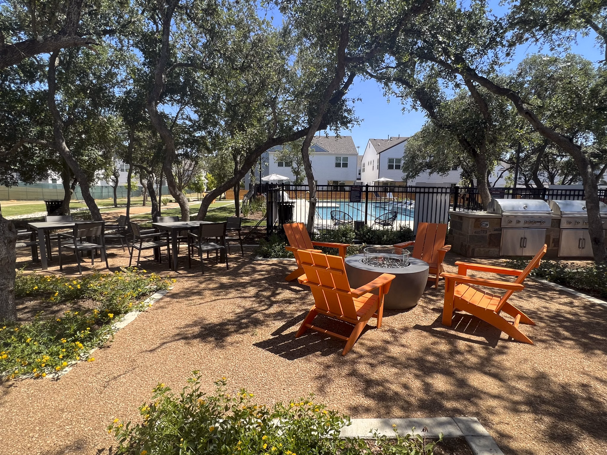Stylish outdoor grill area at Farm Haus Luxury Rental Homes Apartments, perfect for gatherings and barbecues
