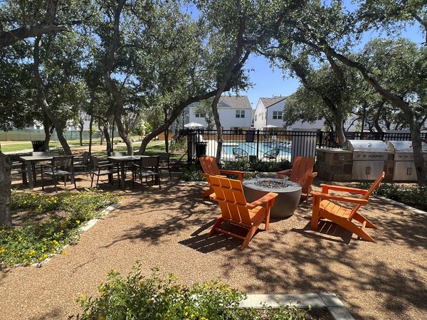 Stylish outdoor grill area at Farm Haus Luxury Rental Homes Apartments, perfect for gatherings and barbecues