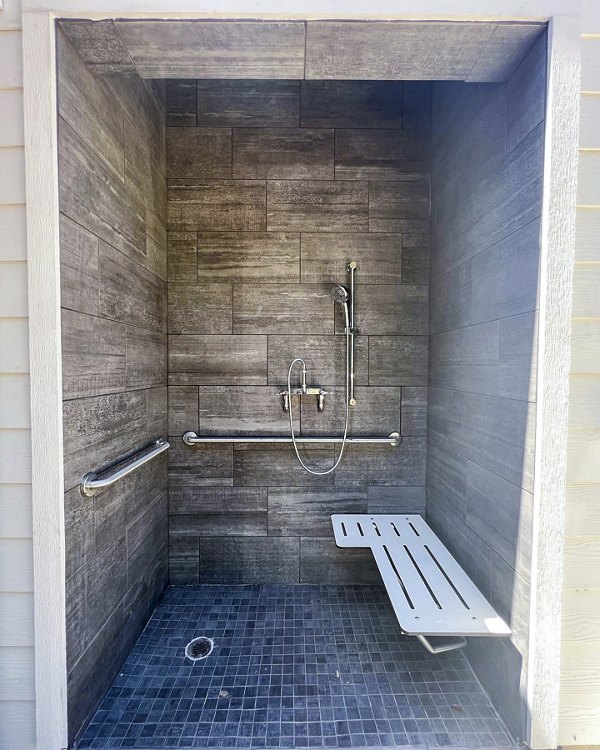 pool shower at Farm Haus Luxury Rental Homes