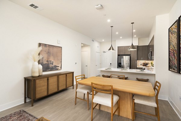 Dining room featuring elegant decor and modern lighting in Quarter North Apartments luxury apartments