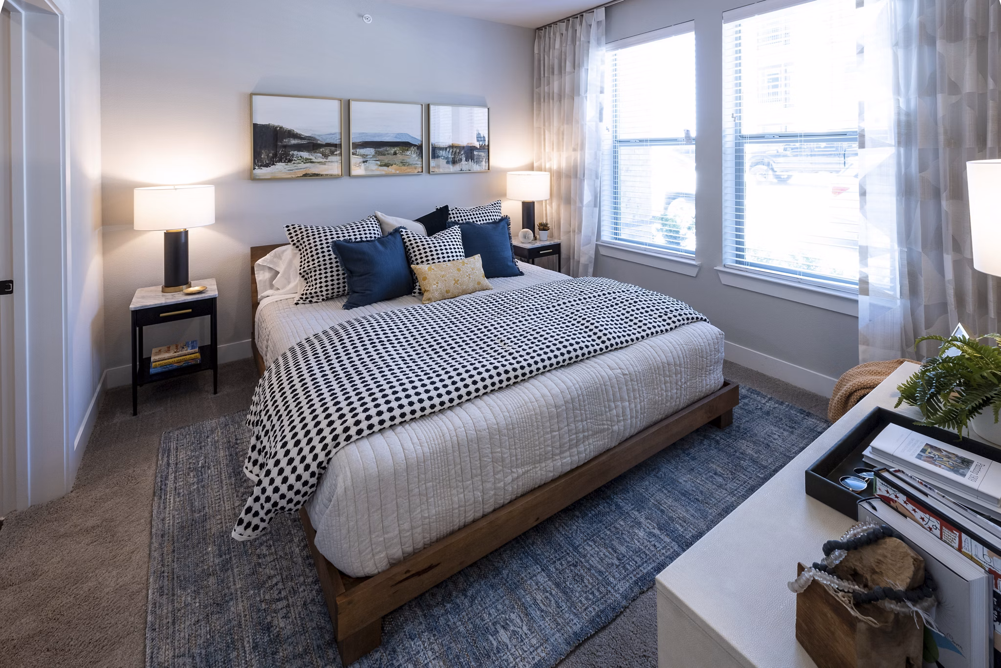 Cozy bedroom with modern furnishings at Union House Apartments