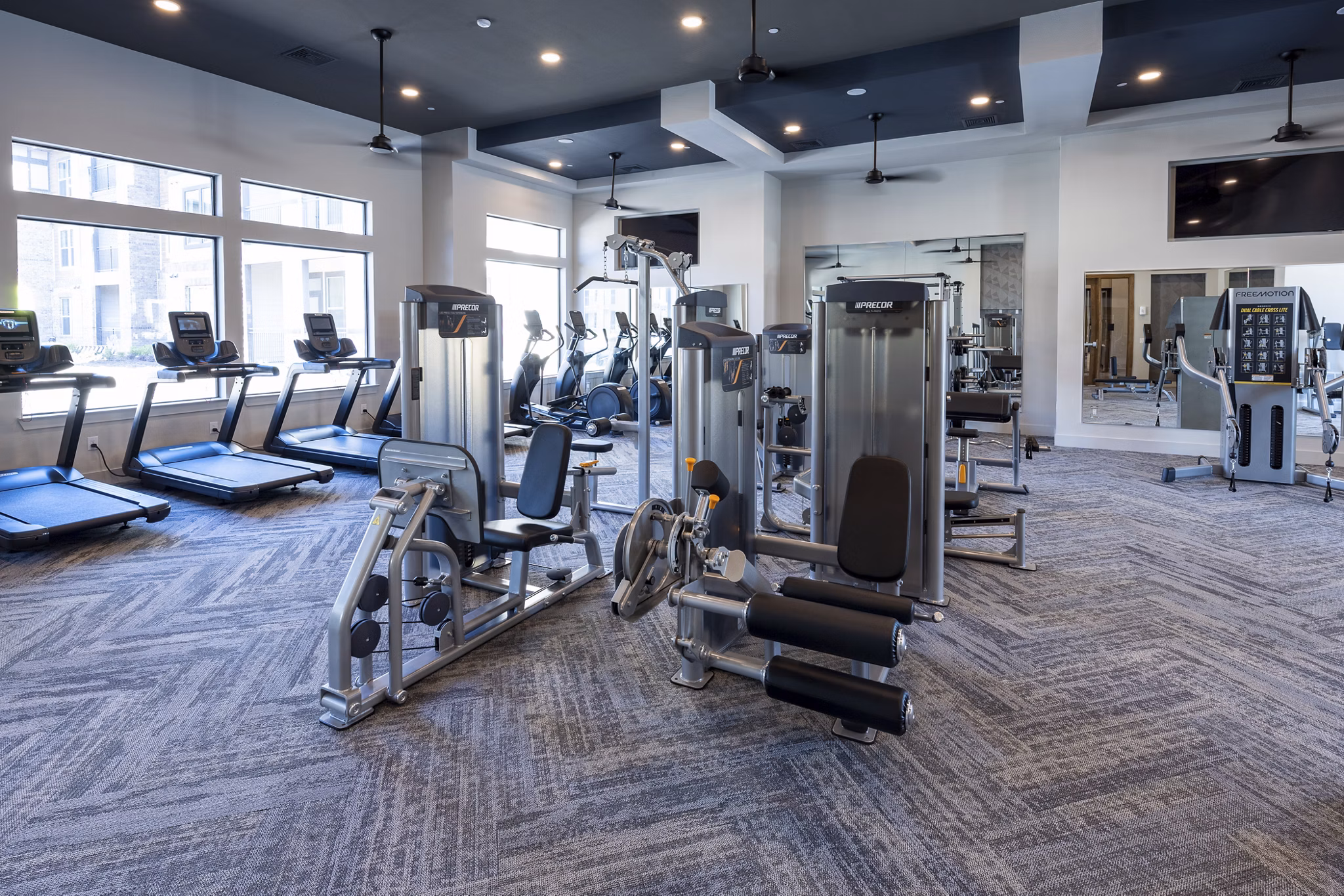Modern fitness center with state-of-the-art equipment at Union House Apartments, perfect for achieving a healthy lifestyle and peak fitness