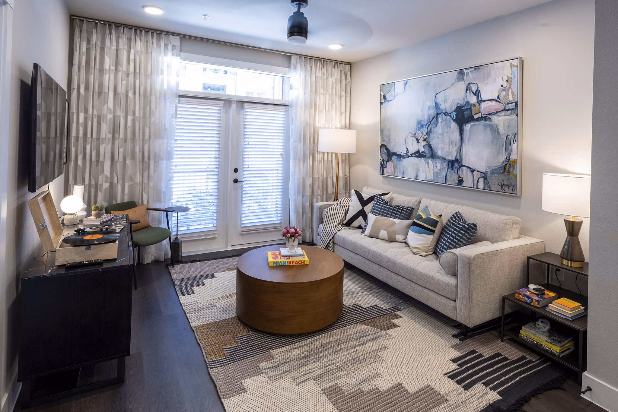 Bright living room with modern decor in Union House Apartments luxury community