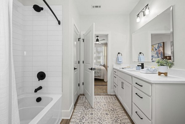 Modern bathroom with sleek fixtures at Evermore Apartments, a Greystar luxury residence