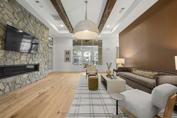Clubhouse with modern design and luxe seating at Evermore Apartments in luxury Greystar community