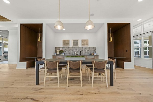 Clubhouse with modern decor and seating at Evermore Apartments, a Greystar luxury apartment community