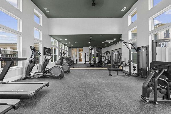 State-of-the-art fitness center with modern equipment at Evermore Apartments