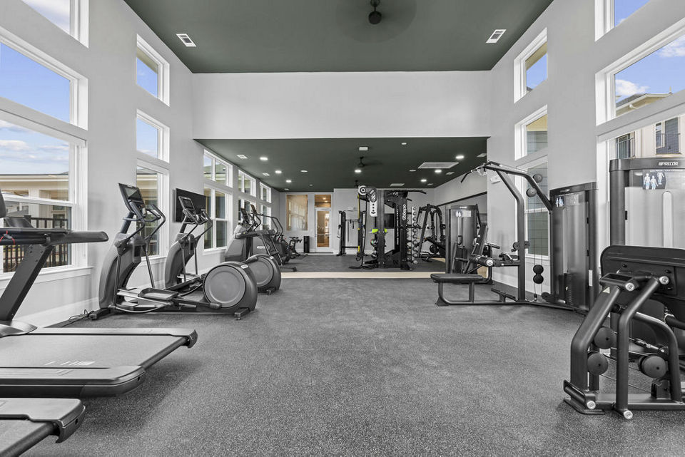 State-of-the-art fitness center with modern equipment at Evermore Apartments