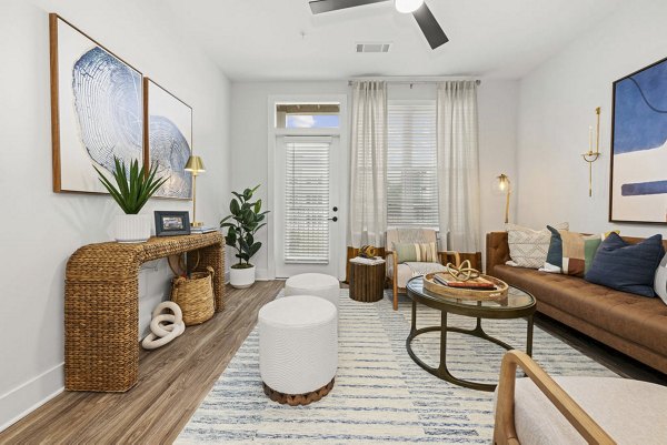 Spacious living room with modern furnishings at Evermore Apartments